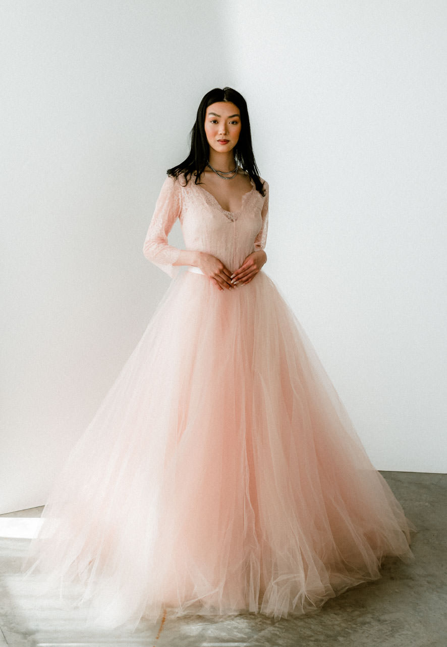 Rented Dress the bridal and maternity dress rental company by Claire La Faye for styled wedding shoots, workshops, and publications. model wearing pink lace and tulle ball gown Adagio.
